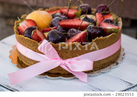 Cheesecake with fruits and berries on the planks Cheesecake with fruits and berries on the planks 29023553