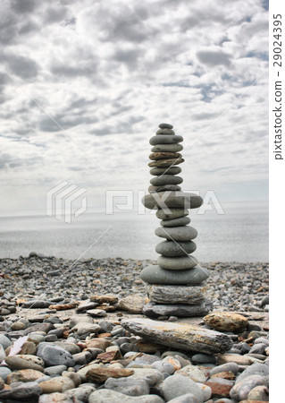 stones balancing on top of each other on a beach stones balancing on top of each other on a beach 29024395