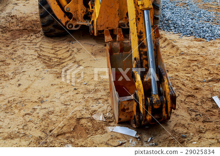 Yellow excavator loader at construction Yellow excavator loader at construction 29025834