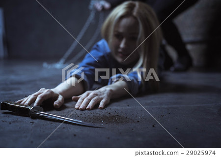 Brutal kidnapper dragging his victim away from 29025974