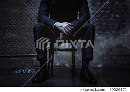 Powerful criminal posing with a pistol 29026171