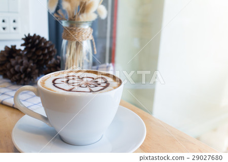 hot coffee with foam milk art in afternoon break hot coffee with foam milk art in afternoon break 29027680