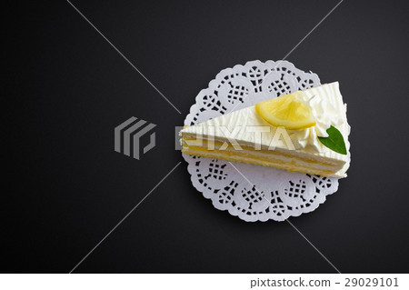 Lemon cake on black background Lemon cake on black background 29029101