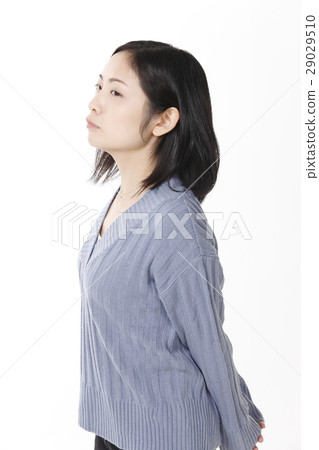 Young lady sharpening her mouth 29029510