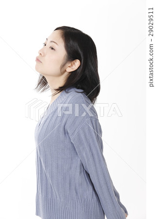 Young lady sharpening her mouth 29029511