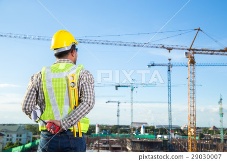 Foreman inspector checking the construction site Foreman inspector checking the construction site 29030007