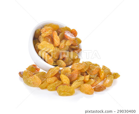 yellow raisins  on white background 29030400