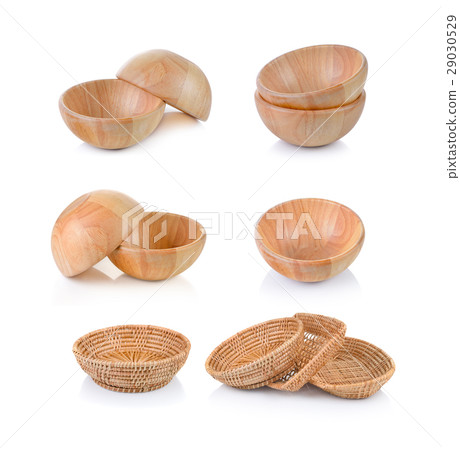 wooden bowl and wicker basket on white background 29030529