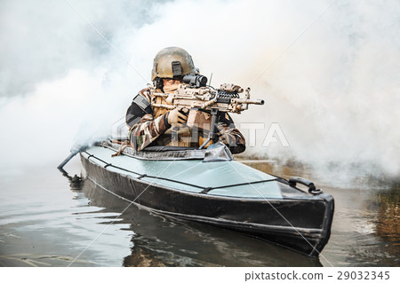 Militants in army kayak Militants in army kayak 29032345
