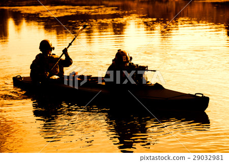 Militants in army kayak Militants in army kayak 29032981