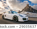 Luxury sports car, at the Jiau Pass in the Italian Alps 29035637