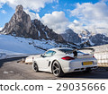 Luxury sports car, at the Jiau Pass in the Italian Alps 29035666