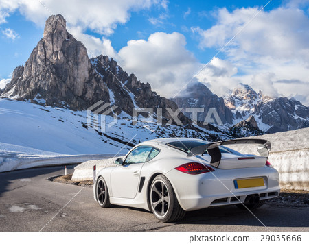 Luxury sports car, at the Jiau Pass in the Italian Alps 29035666