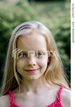 Portrait of a beautiful blonde little girl. 29035674