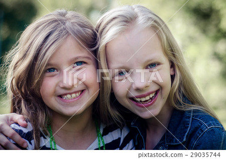 Close up of face of happy children while laughing. 29035744