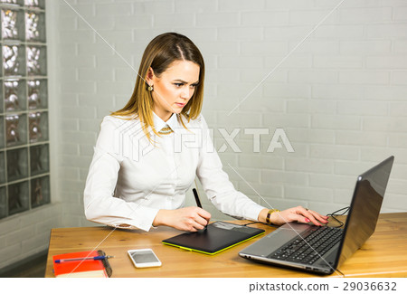 Female designer in office working with digital 29036632