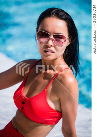 Close up lifestyle portrait of Cute girl swimming 29036734