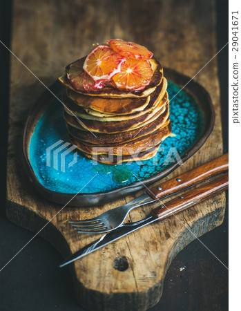 Pancakes with honey and bloody orange slices on Pancakes with honey and bloody orange slices on 29041671
