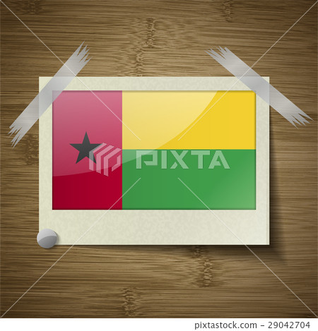 Flags GuineaBissau at frame on wooden texture. Vec Flags GuineaBissau at frame on wooden texture. Vec 29042704