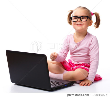 Little girl with laptop 29043023