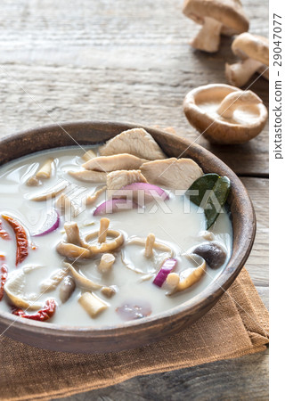 Bowl of thai tom kha kai soup 29047077