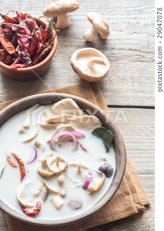 Bowl of thai tom kha kai soup 29047078