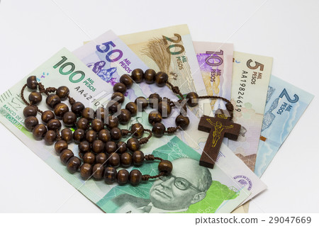 Conceptual image about money and religion Conceptual image about money and religion 29047669