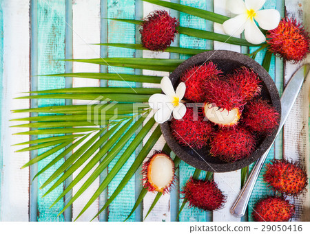 Fresh rambutans in a bowl. Copy space. Top view 29050416