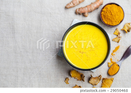 Turmeric drink, latte, tea, milk with cinnamon. Turmeric drink, latte, tea, milk with cinnamon. 29050468