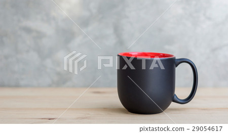 black coffee cup on a wooden background. 29054617
