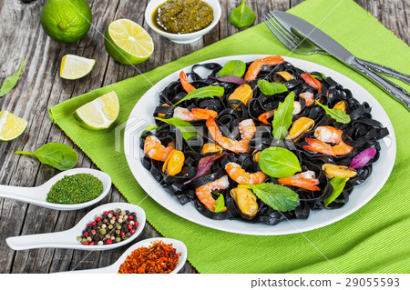 black noodles salad with seafoods 29055593