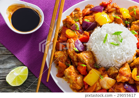 rice with Sweet and Sour fried pork and vegetables 29055617