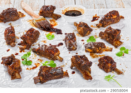 hot sticky ribs seasoned with barbecue sauce hot sticky ribs seasoned with barbecue sauce 29058004