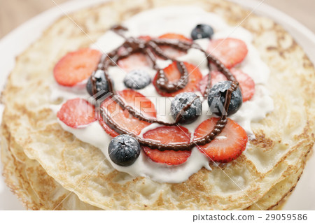 fresh blinis or crepes with fresh berries and fresh blinis or crepes with fresh berries and 29059586
