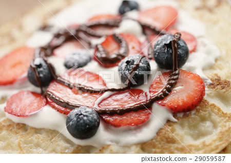 fresh blinis or crepes with fresh berries and fresh blinis or crepes with fresh berries and 29059587