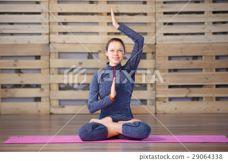 Young attractive woman practicing yoga, exercise 29064338