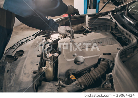 Mechanic hands checking up of serviceability of Mechanic hands checking up of serviceability of 29064424