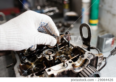 Engine crankshaft, valve cover, pistons. mechanic Engine crankshaft, valve cover, pistons. mechanic 29064426