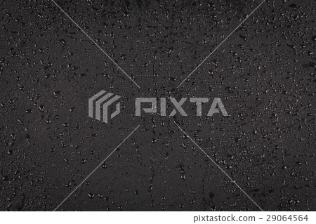 Water drops on dark stone Water drops on dark stone 29064564