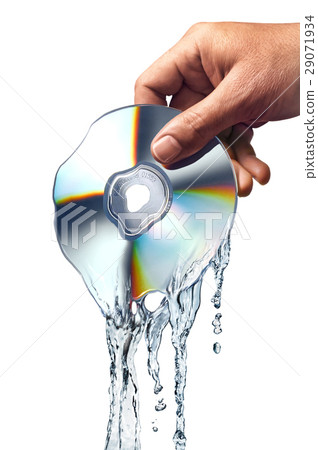 Man hand holding a compact disc whis is melting and morphing into water ripples. 29071934