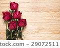 Red roses on wooden board 29072511