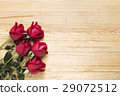 Red roses on wooden board 29072512