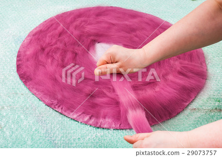 packing of wool fibers on back side of hat layout 29073757