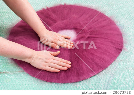 milliner presses fibers on back side of hat layout milliner presses fibers on back side of hat layout 29073758