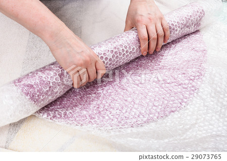 hatter rolls the wool fibers with hat layout 29073765