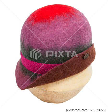 cloche hat is molded on wooden hat block isolated 29073772