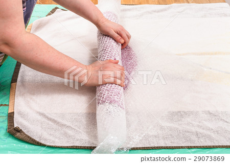 rolling the wool fibers with hat layout 29073869