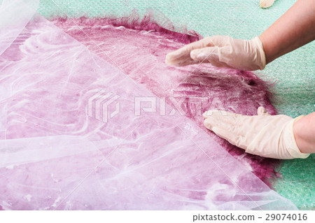 lathering the wool fibers on layout 29074016