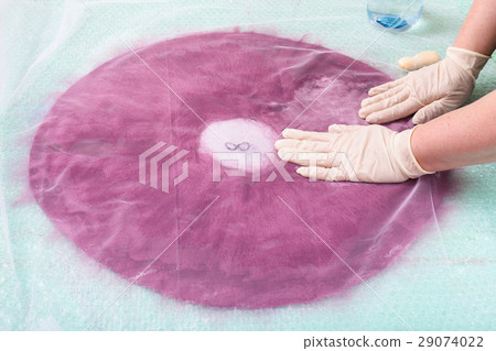 hatter soaps the fibers on back side of hat layout 29074022