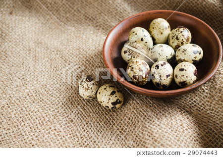 Fresh Organic Quail Eggs in a Ceramic Bowl. 29074443